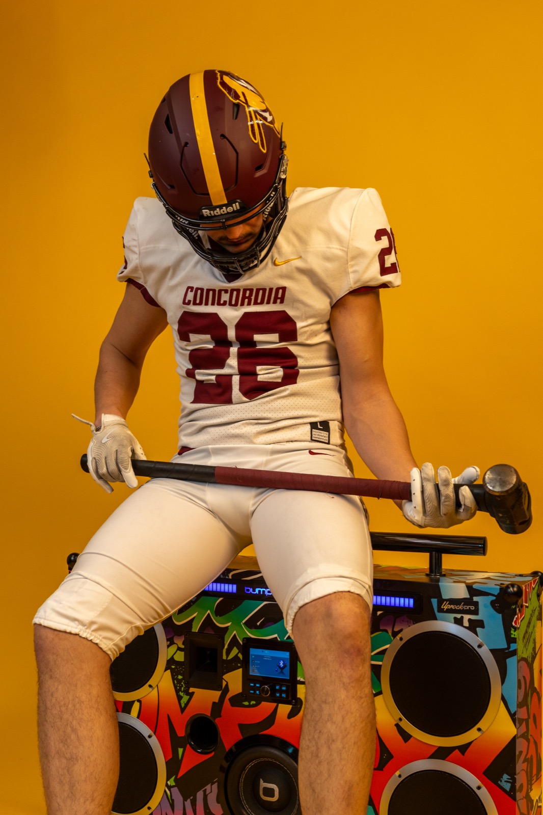 Concordia Stingers player seated with sledgehammer